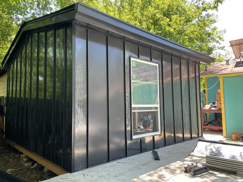 Black standing seam metal wall panels for Roof Inspection in Monaca